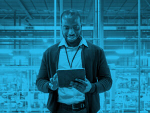 Man holding tablet at work